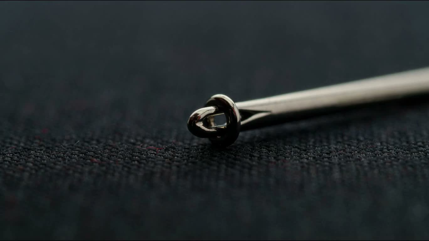 Dark Cloth Pierced by Red Thread