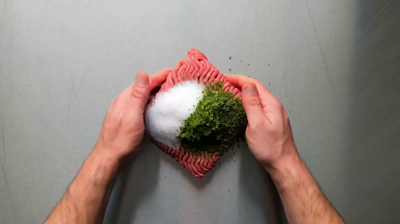 熔心芝士肉丸的俯拍烹饪循环 — AI video creation