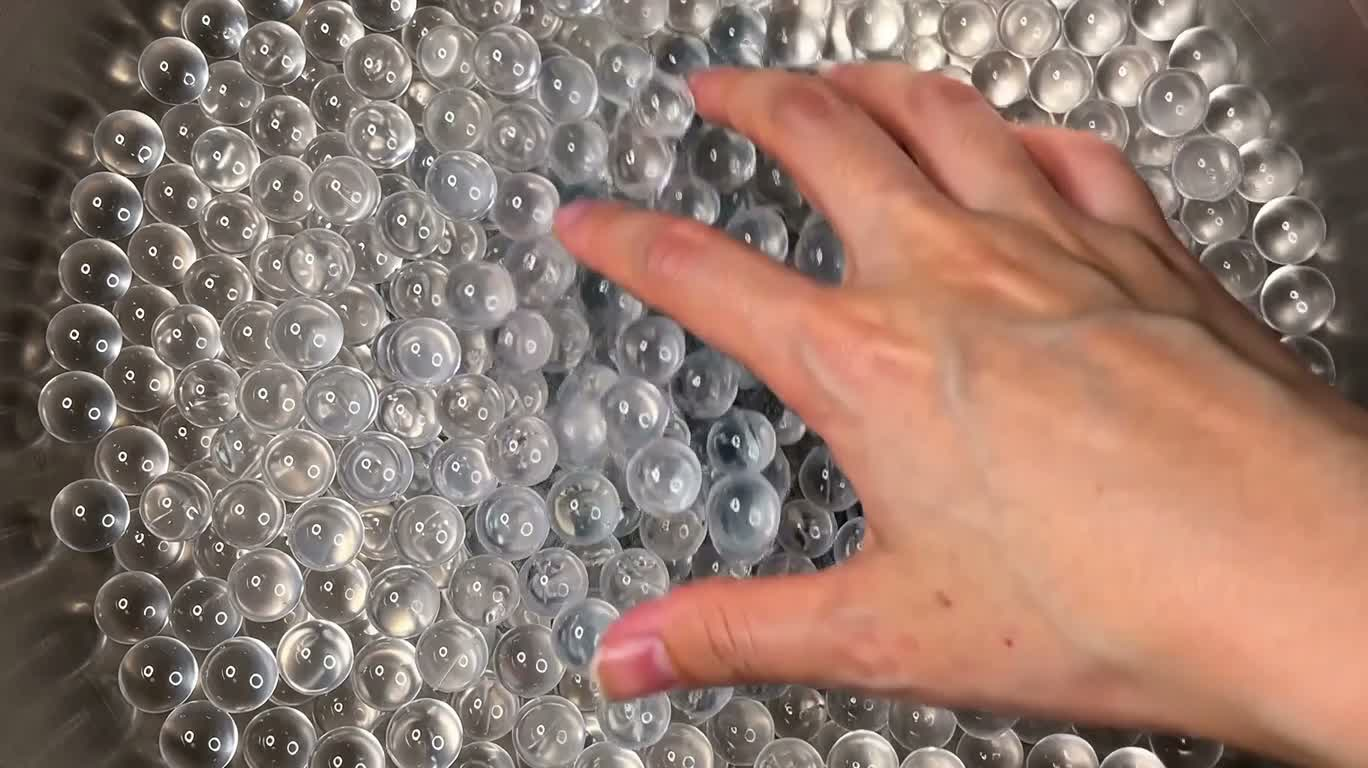 Squeezing Translucent Water Droplets — AI video creation
