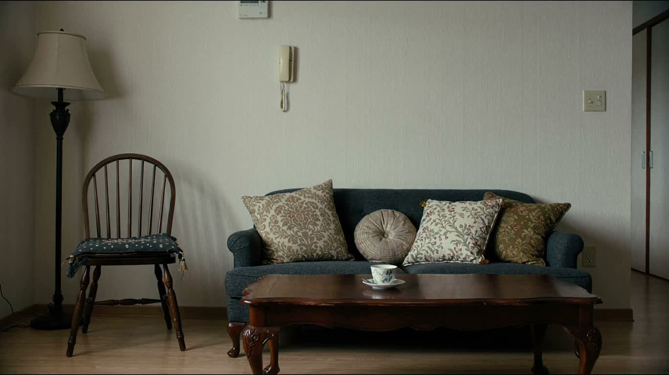 Frontal Composition with Sofa and Chair on the Left