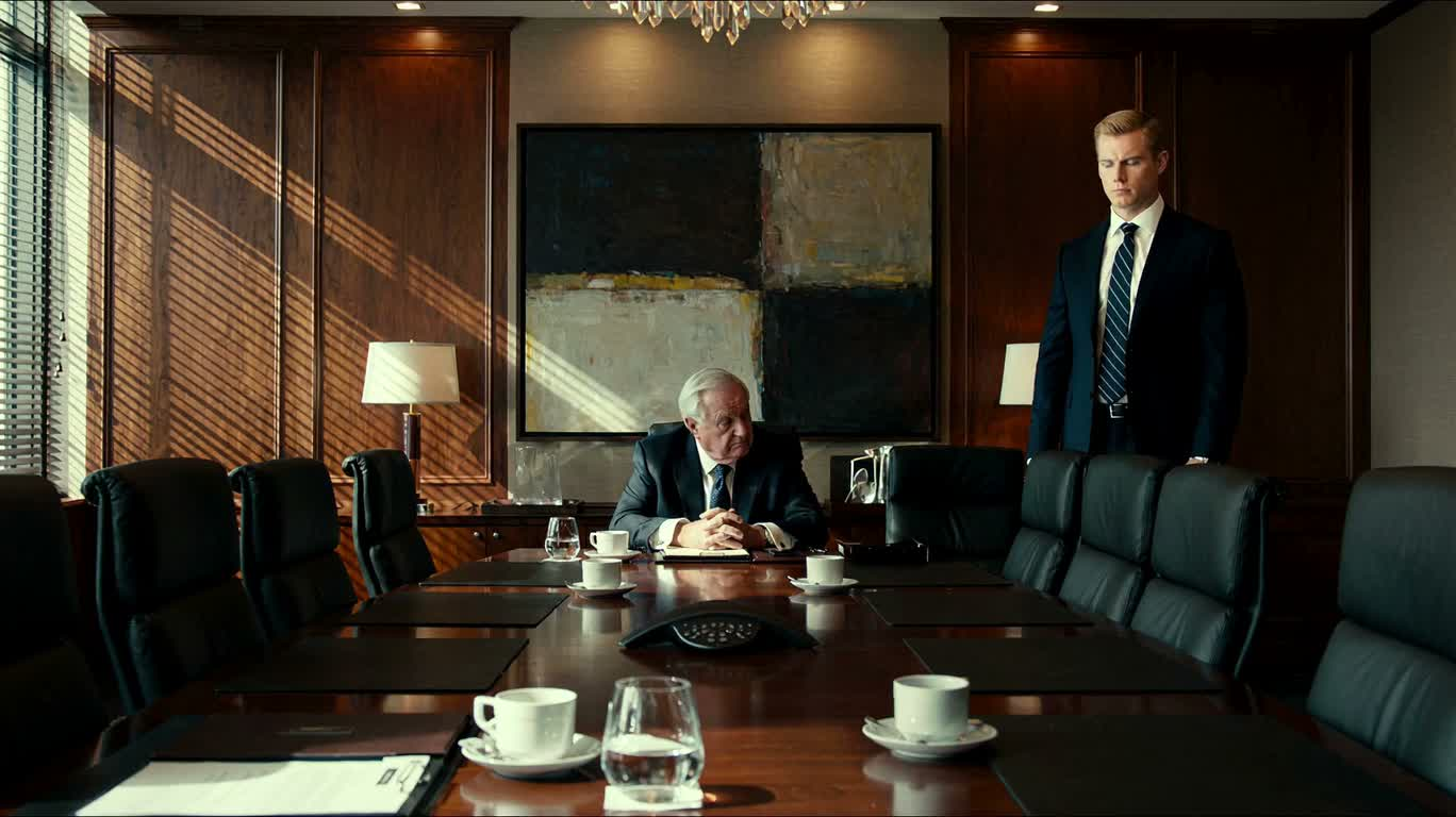 The Chairman Scrutinizes the Young Executive