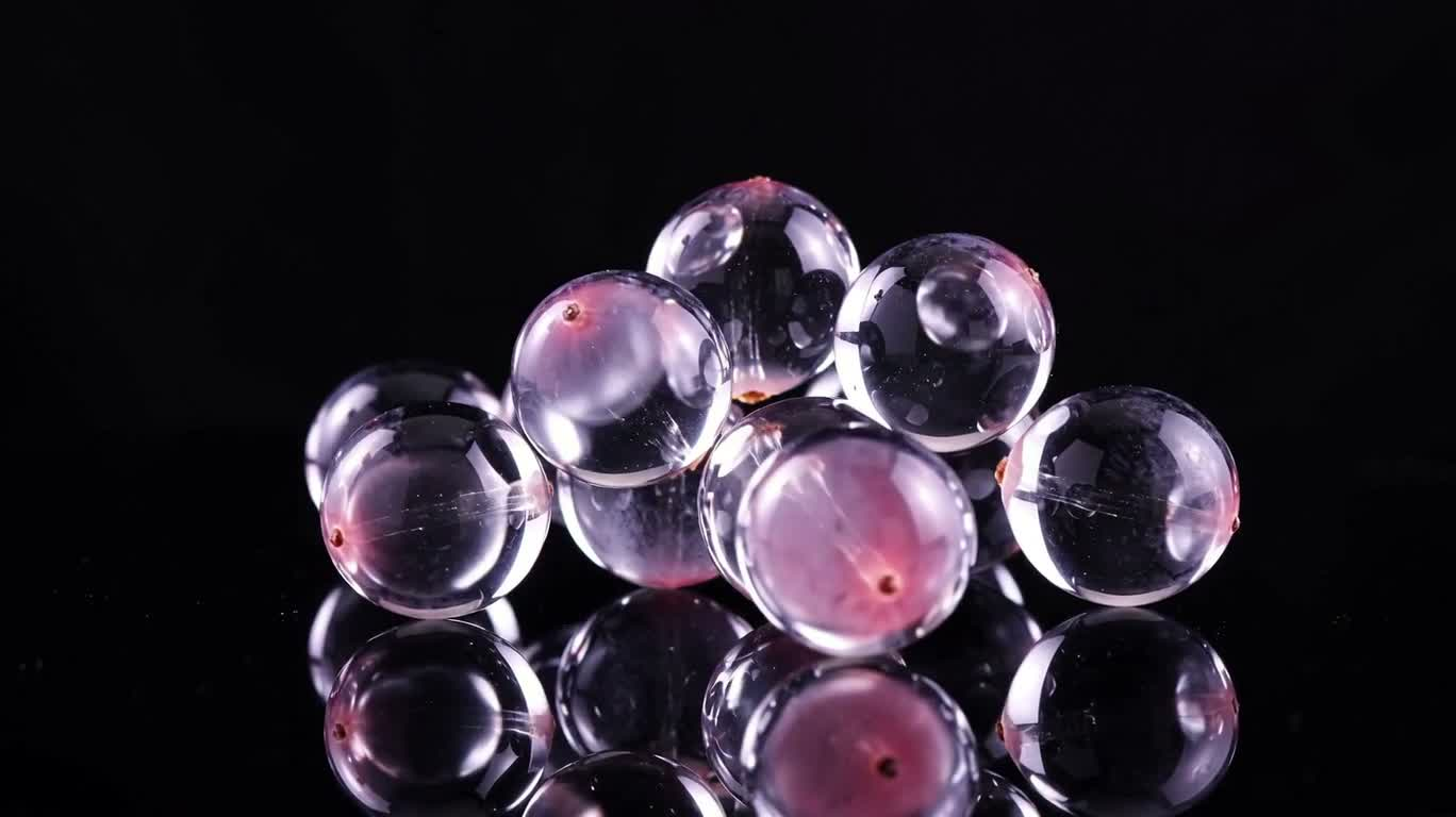 Crystal Grapes Under Purple-Pink Light