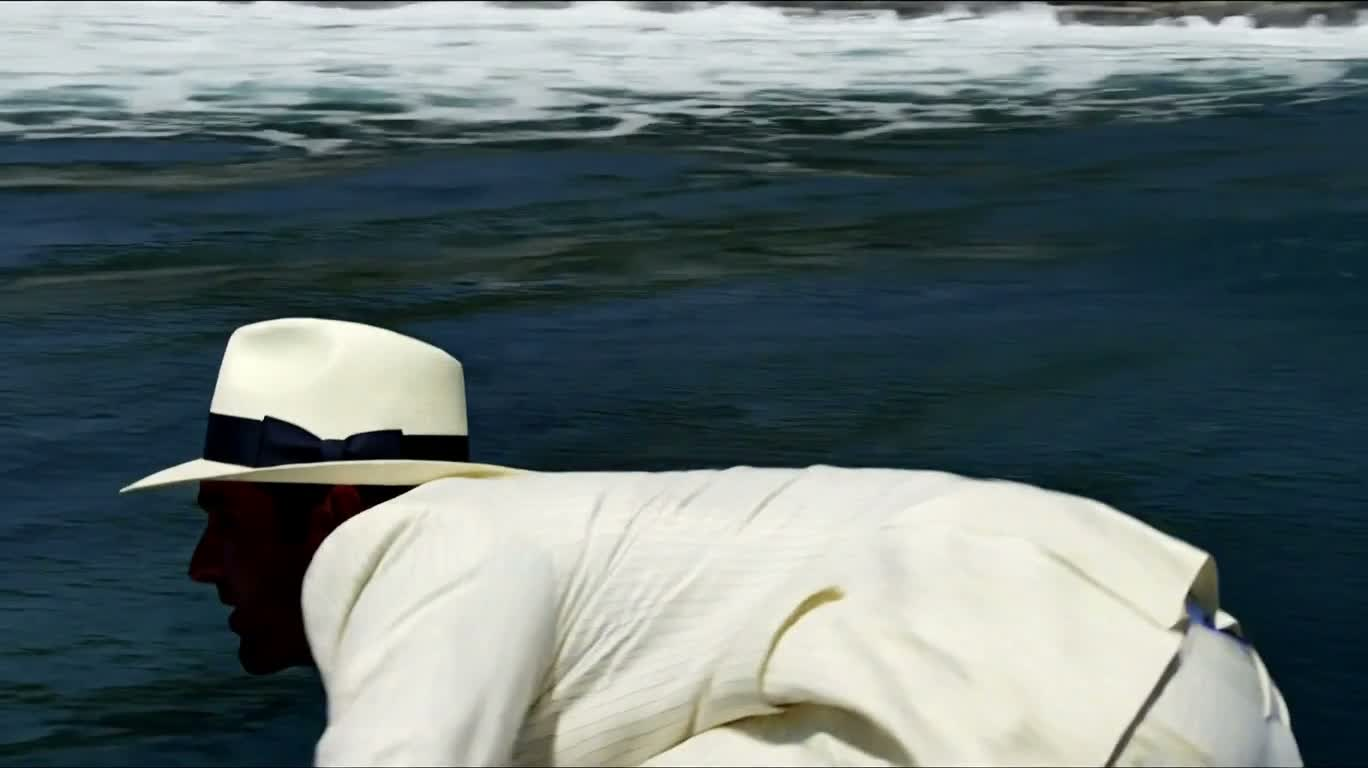 白色西装冲浪者的海上腾跃 — AI video creation